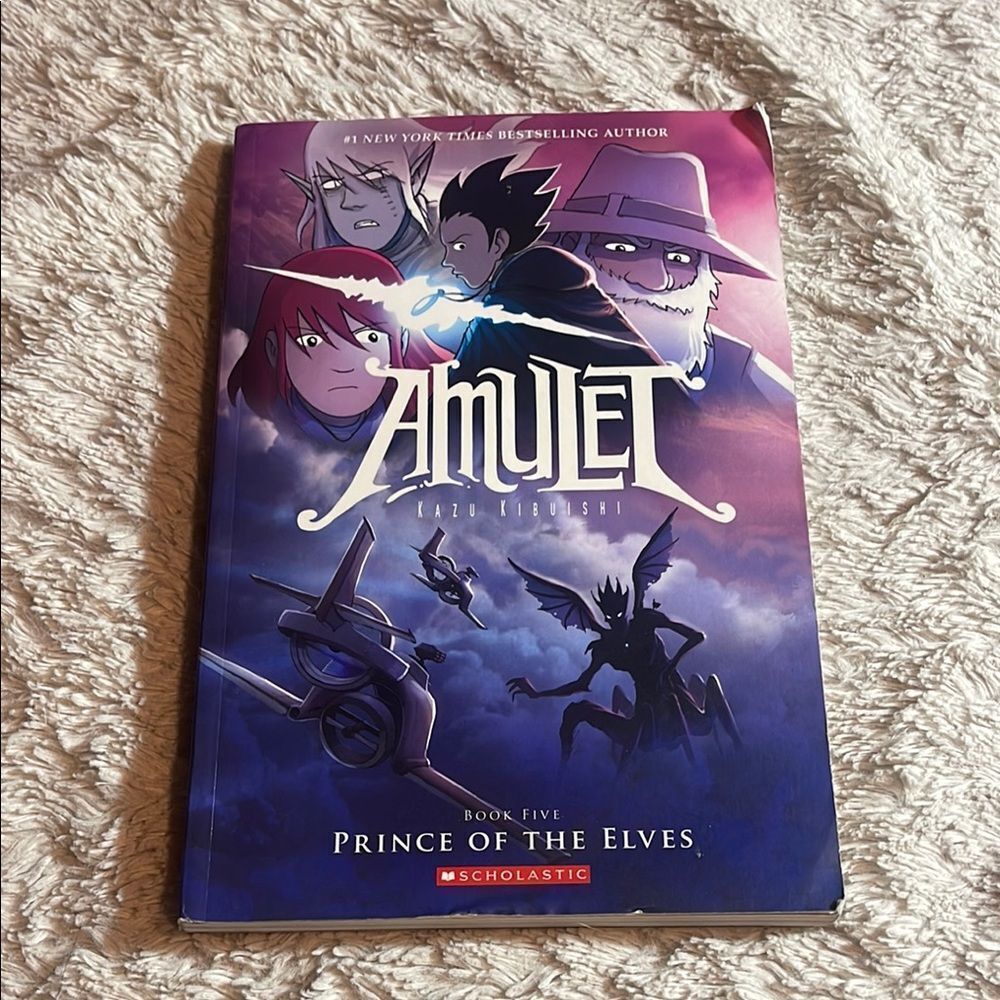 Scholastic Amulet Graphic Novel with Blue Cover